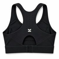 Top deportivo ASTRA de VALTIK en color Ónix, vista posterior del producto con ventilación y cierre ajustable.