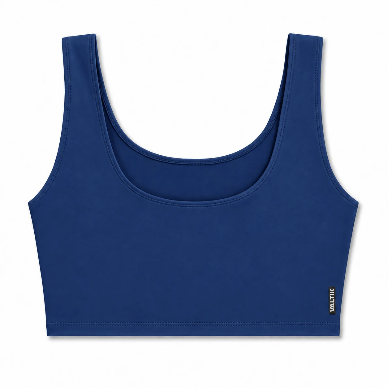 Top deportivo AURA de VALTIK para mujer en azul petróleo, vista frontal del producto sobre fondo blanco.