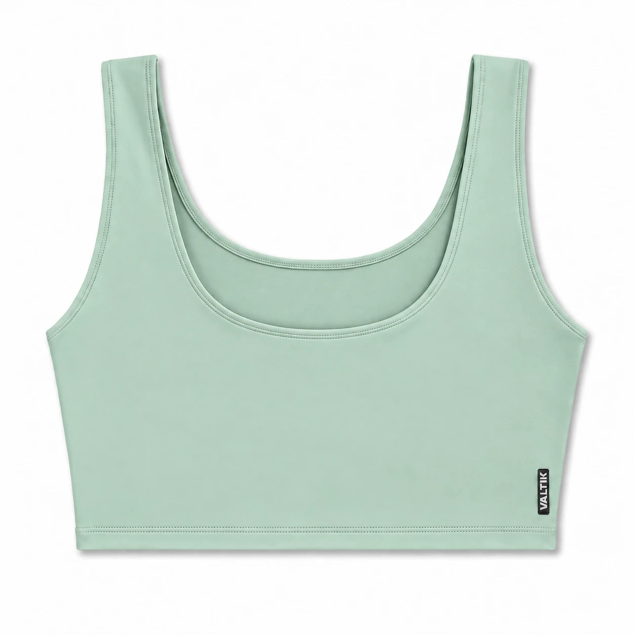 Top deportivo AURA de VALTIK para mujer en menta, vista frontal del producto sobre fondo blanco.