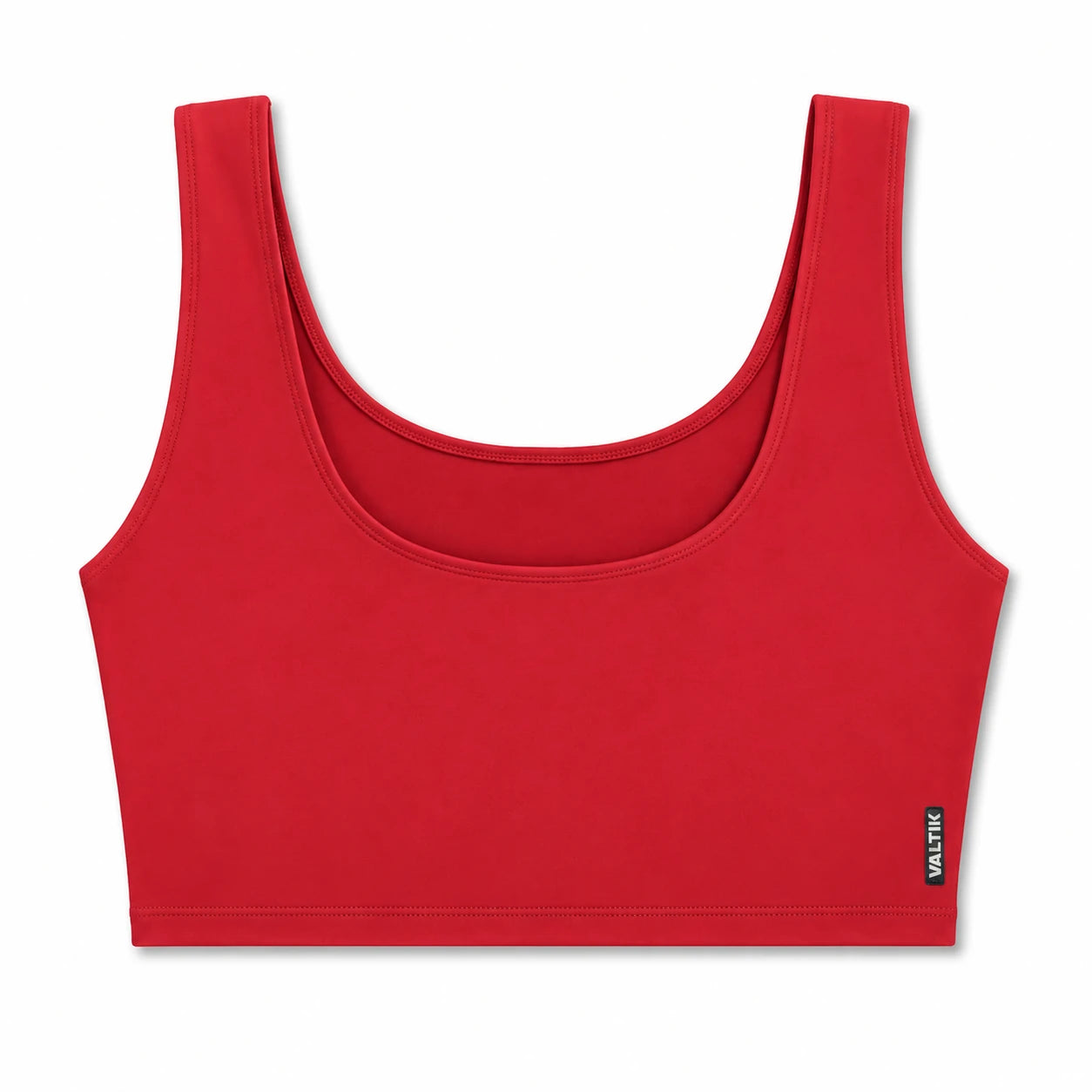 Top deportivo AURA de VALTIK para mujer en rojo, vista frontal del producto sobre fondo blanco.