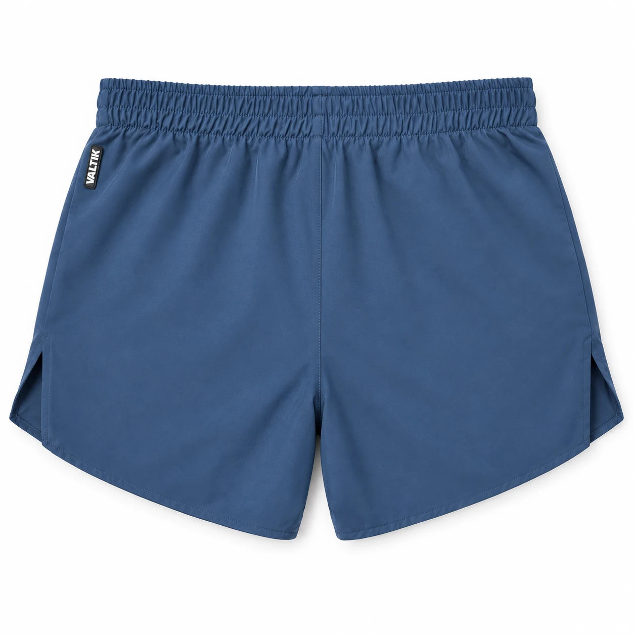 Short deportivo STRIDE de VALTIK para hombre en color azul petróleo, vista posterior del short extendido sobre fondo claro.