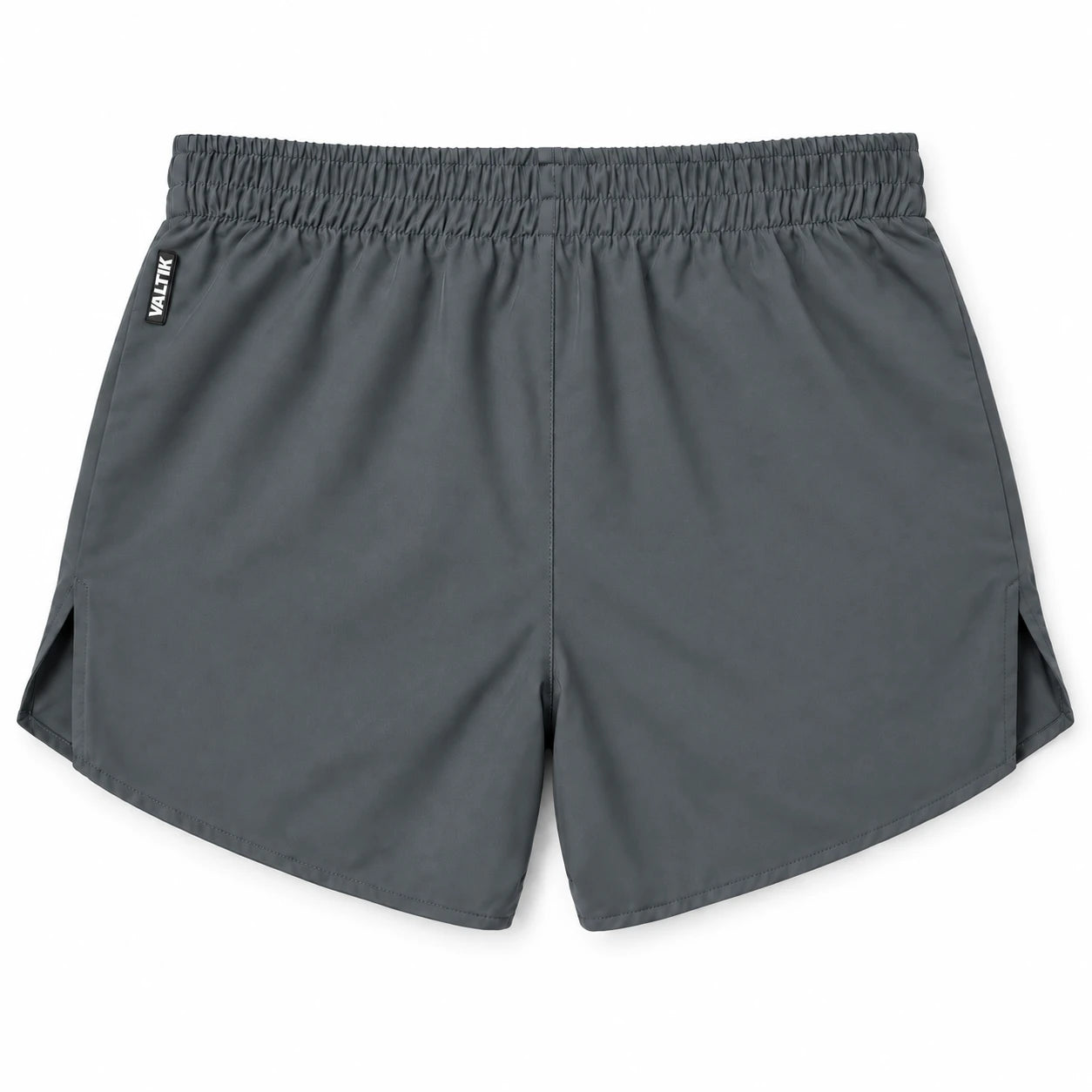 Short deportivo STRIDE de VALTIK para hombre en color gris, vista posterior del short extendido sobre fondo claro.