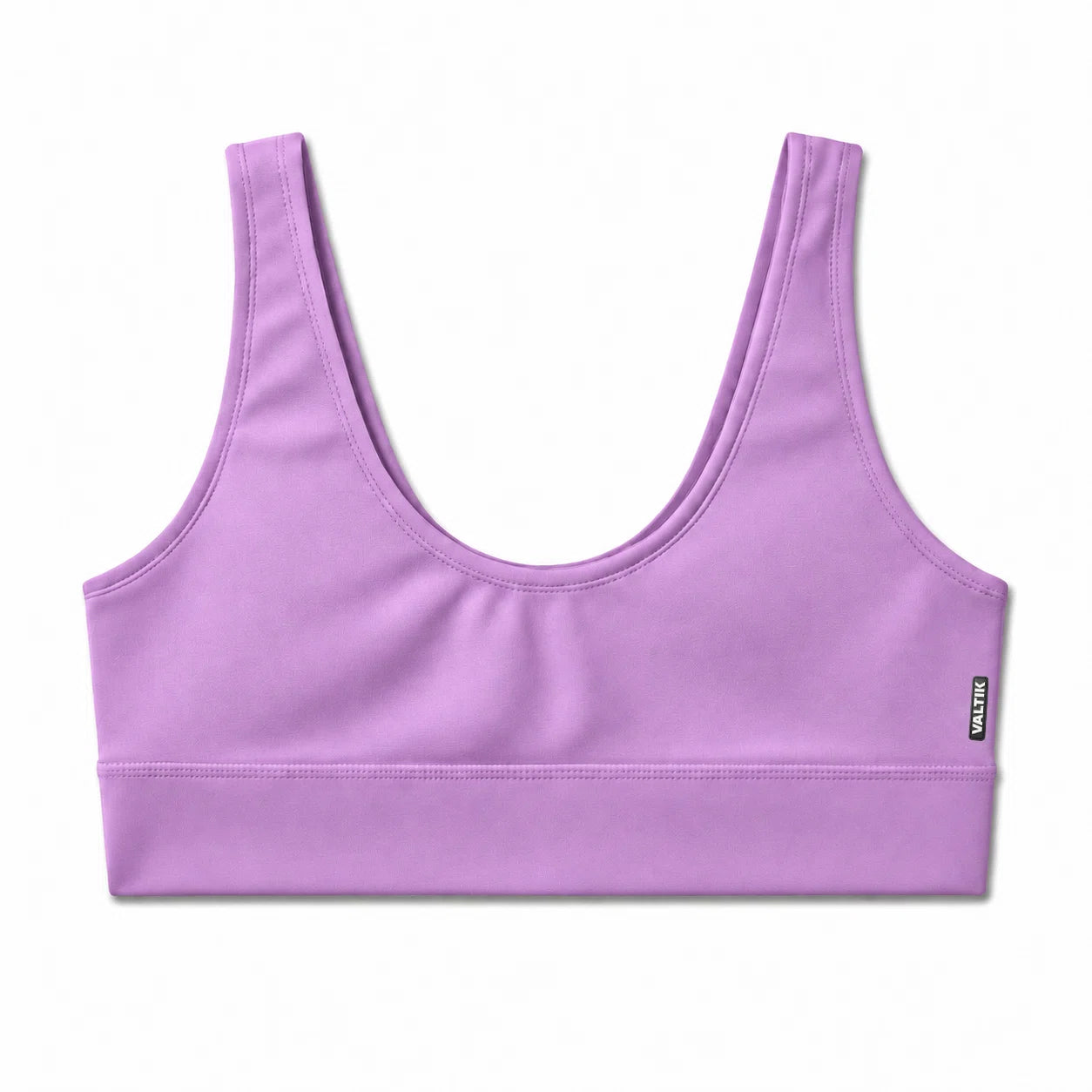 Top deportivo VEGA de VALTIK para mujer en lila, vista frontal del producto sobre fondo blanco.